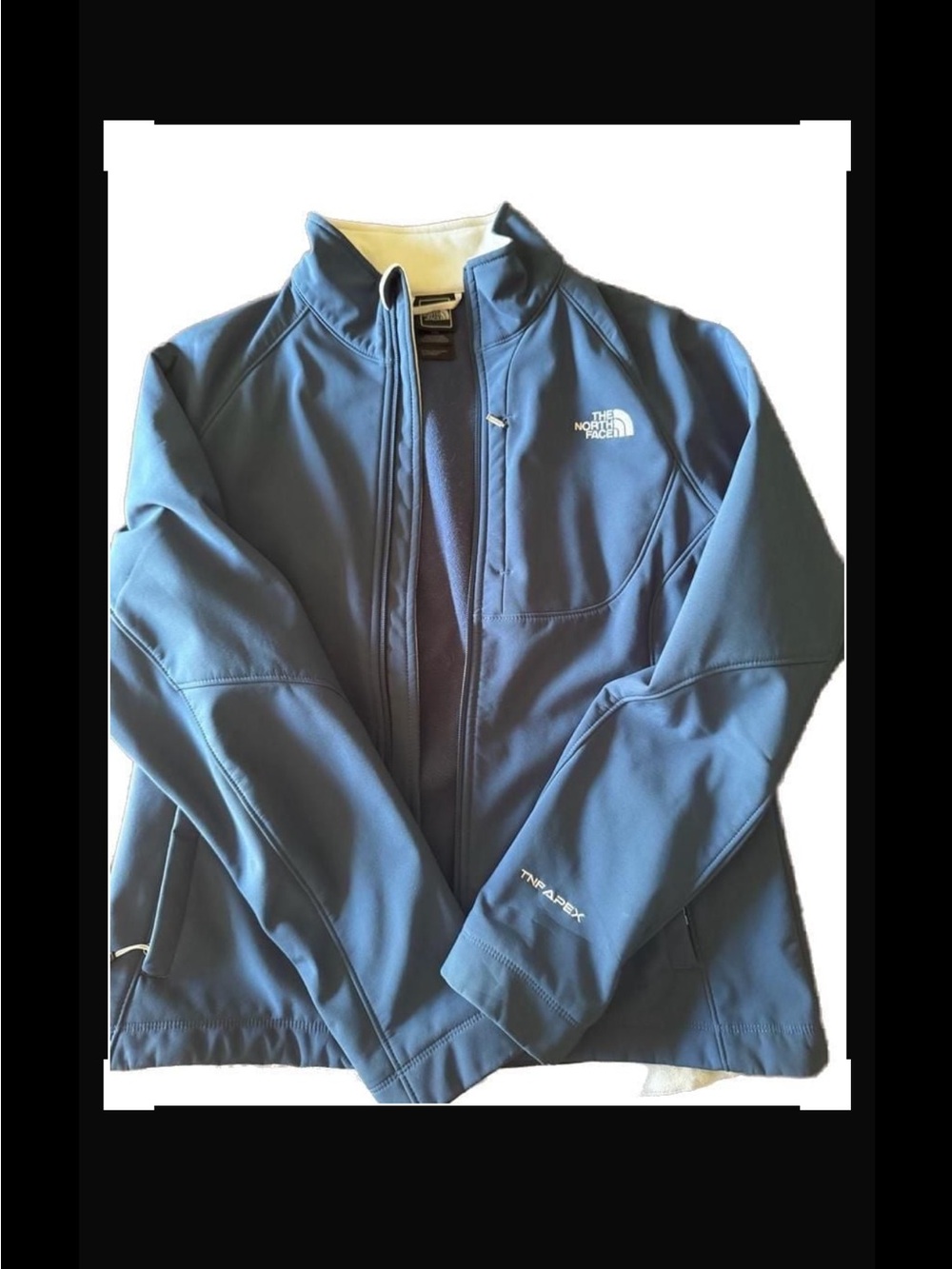 The North Face Navy Blue Softshell Ski Jacket with White Logo